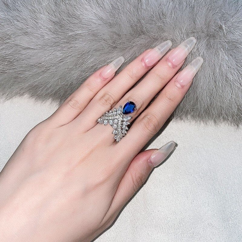 Blue Sapphire Pear Cut Crown Unique Silver Ring